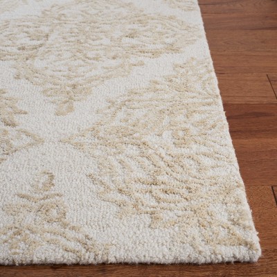 Ivory and Beige Abstract Handmade Wool Tufted Rug, 2' x 3'