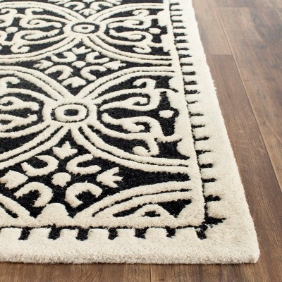 Black and Ivory Hand-Tufted Wool Geometric 9' x 12' Area Rug