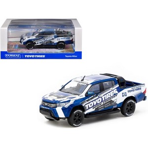 Toyota Hilux Pickup Truck RHD "Toyo Tires" White and Blue with Graphics "Hobby64" Series 1/64 Diecast Model Car by Tarmac Works - 1 of 3