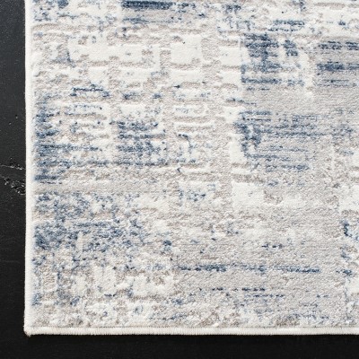 Ivory and Blue Hand-Knotted Round Synthetic Area Rug