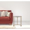 HomeRoots Set Of Two 23" Gold Glass And Steel Round Nested Tables - 2 of 4
