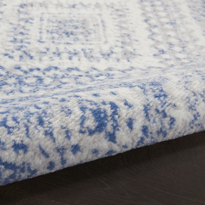 Ivory Geometric Synthetic Easy Care 6' x 9' Area Rug