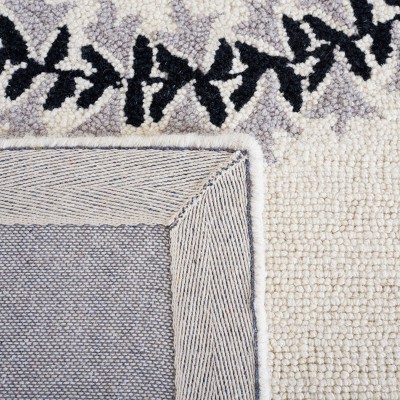 Empire Black and Ivory Hand-Tufted Wool Area Rug