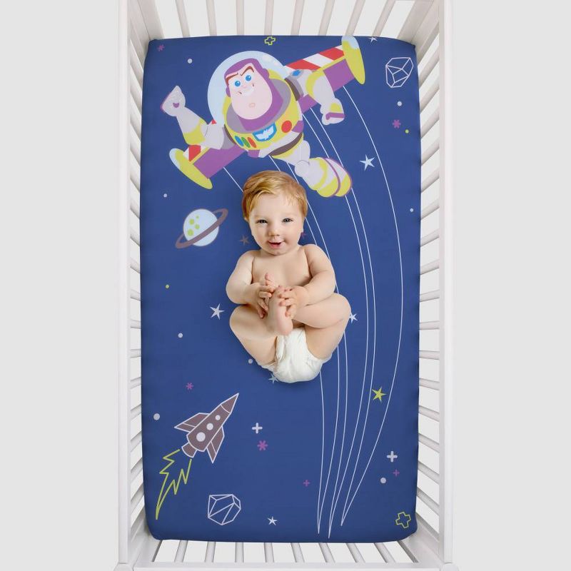 Disney Baby Toy Story Buzz Lightyear Photo Op Fitted Crib Sheet - Blue and Green, 3 of 5