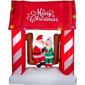 Gemmy Animated Christmas Inflatable Mr. and Mrs. Claus on Swing, 7 ft Tall, Multi - 1 of 4