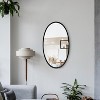 MAYEERTY Oval Decorative Metal Wall Mirror withh Framed Edges and Wooden Backing Black 30.98"x20.98" - 2 of 4