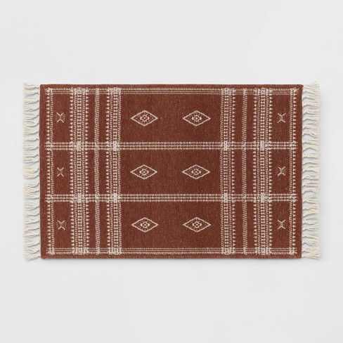 Rust coloured throw discount rug