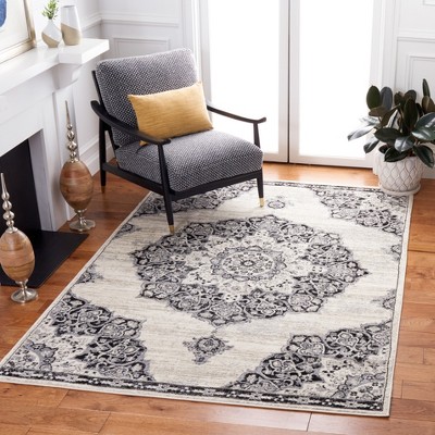 Ivory and Black Synthetic Rectangular 8' x 10' Area Rug