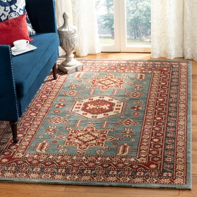 Ivory and Turquoise Geometric Synthetic 9' x 12' Area Rug