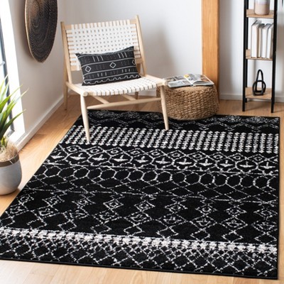Black and Ivory Hand-knotted Synthetic Round Area Rug