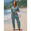 EXLURA Women's 2025 Summer Jumpsuits Casual Dressy One Piece Deep V Neck Batwing Short Sleeve Wrap Waist Romper with Pockets - 2 of 4