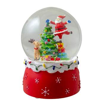 Northlight 5.75" Santa Decorating a Christmas Tree Musical Snow Globe
