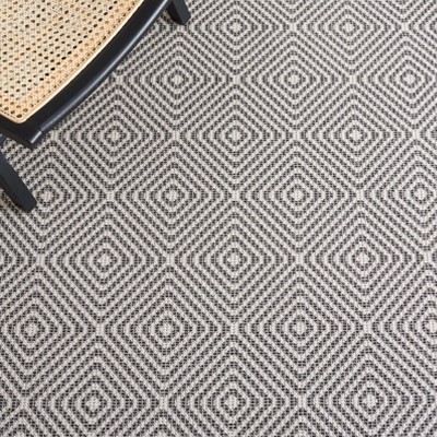 Ivory and Black Geometric Flat Woven Area Rug