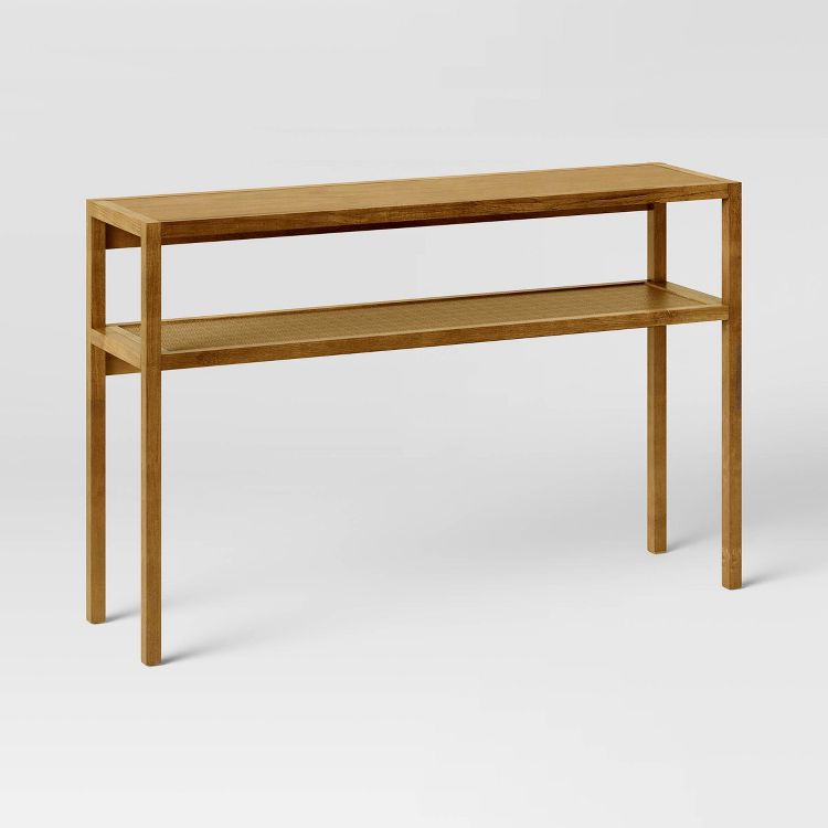A narrow wooden console table with a rectangular top and a lower shelf, supported by four legs.