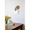 Elegant Lighting Hanson 1 light bath sconce in black with brass with clear shade - 2 of 4