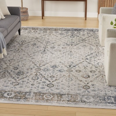Ivory Blue Floral Synthetic 8' x 10' Washable Rug