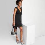 Women's Sleeveless Handkerchief Hem Fit & Flare Mini Dress - Wild Fable™