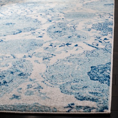 Beige and Turquoise 4' x 6' Synthetic Reversible Area Rug