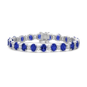 Guili Sterling Silver Tennis Bracelet with Oval CZ in White, Pink, Blue, or Green—A Dazzling Statement for Any Elegant Occasion. - 1 of 4