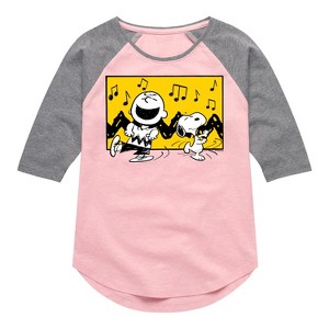 Girls' - Peanuts - Charlie And Snoopy Dance Time Shirt Tail Raglan Graphic T-shirt - 1 of 4