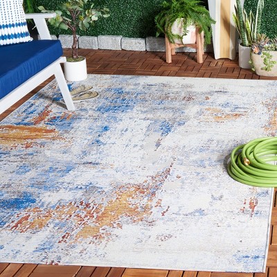 Ivory Abstract Synthetic 4' x 6' Area Rug