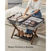 SONGMICS Bamboo Luggage Rack Foldable Suitcase Stand with Fabric Storage Shelf - 2 of 4