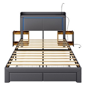 Vlsrka Queen Bed with LED lights and charging station, upholstered headboard with drawers, nightstand, and reading lamp. - 1 of 4