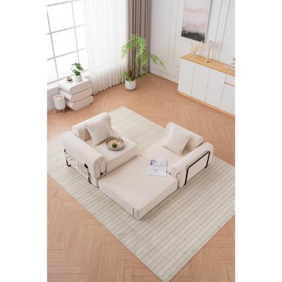 Cream sectional sofa on rug from elevated angle