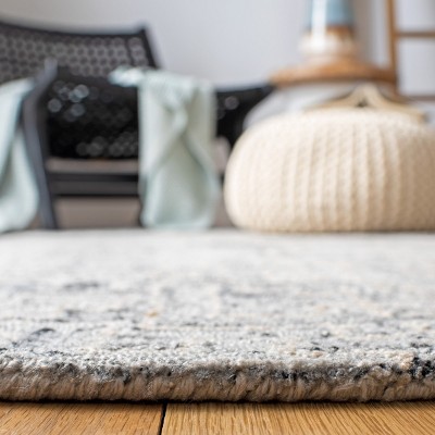 Handmade Ivory and Black Wool Abstract Accent Rug, 2' x 3'