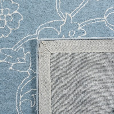 Blue and Ivory Handmade Wool Tufted Area Rug