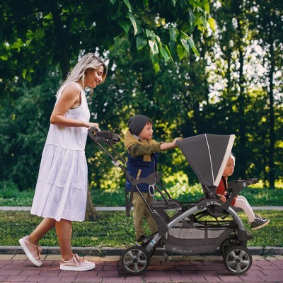 Magnolia Gray Double Tandem Stand-On Plastic Stroller