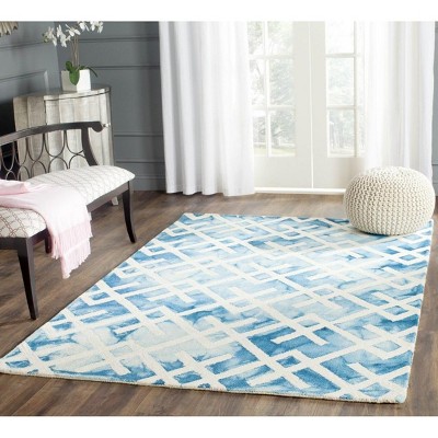 Blue and Ivory Hand-Tufted Wool 4' x 6' Area Rug