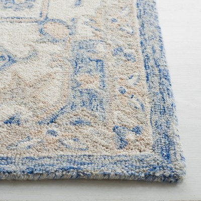 Ivory and Blue Handmade Wool Medallion Area Rug