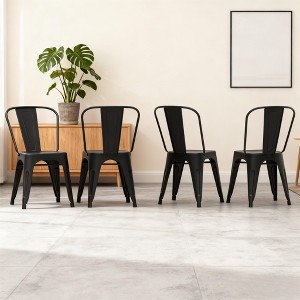Dyonery 4 black metal chairs, with multi-hole seat designs and backrest arcs that conform to the curves of the human back - 1 of 4