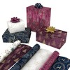 Kirkland 3 Roll Christmas Gift Wrap 270 sq ft Purple Pebble/White Flower/Indigo - 3 of 3
