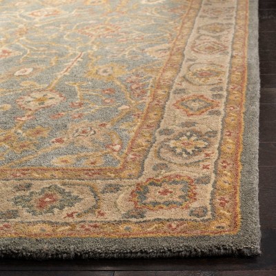 Handmade Blue and Ivory Tufted Wool Area Rug