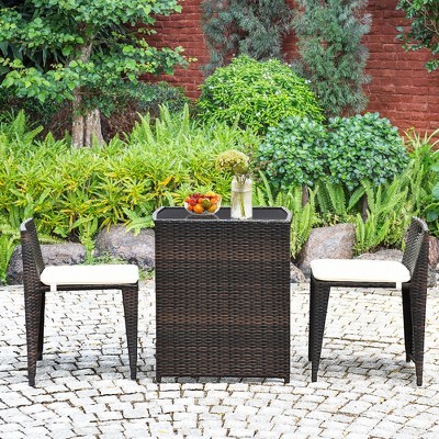 Compact Brown Wicker Outdoor Patio Set with Cushions and Glass Table
