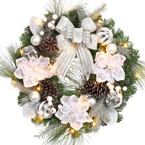 Christmas Wreath with Lights, featuring artificial antler and pinecone baubles, battery-operated, for decorating front doors, walls and windows. - 1 of 4