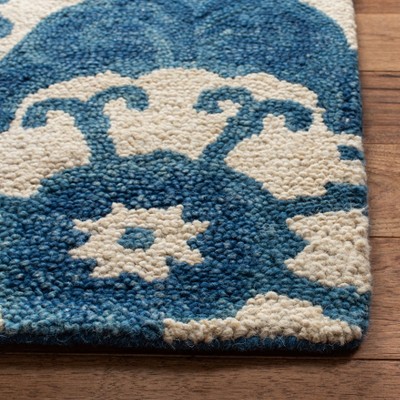 Handmade Blue and Ivory Wool Tufted Area Rug 4' x 6'
