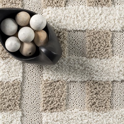 Cordelia Ivory Synthetic 5' x 7'6" Easy-Care Area Rug