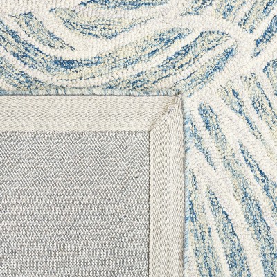 Blue and Ivory Floral Hand-Tufted Wool Area Rug, 4' x 6'