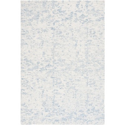 Ebony EBN904 Handmade Tufted Rug - Safavieh