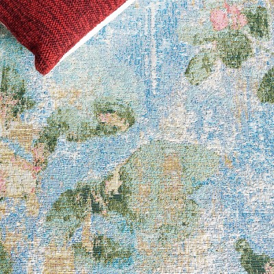 Reversible Light Blue Synthetic 4' x 6' Stain-Resistant Area Rug