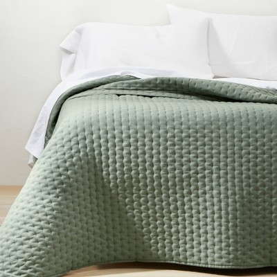 sage green quilt