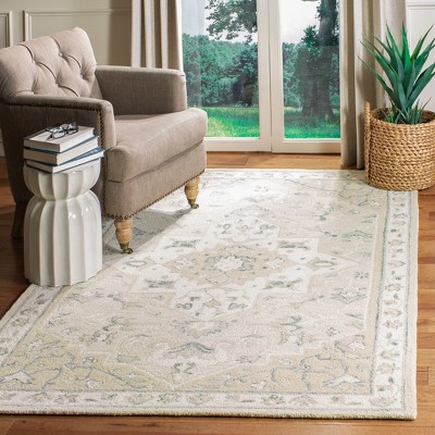 Handmade Beige and Ivory Wool Tufted Area Rug