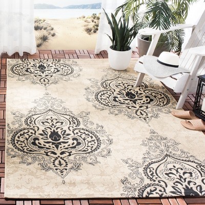 Cream and Black Medallion Synthetic Outdoor Area Rug