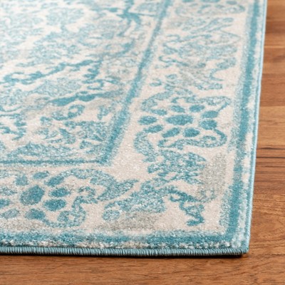 Ivory and Light Blue Hand-knotted Synthetic Area Rug