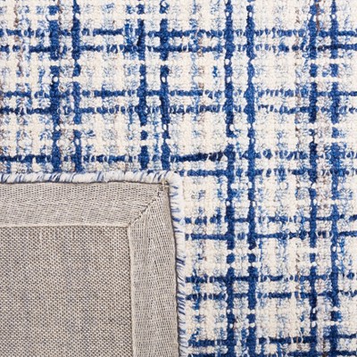 Blue and Ivory Abstract Wool 6' x 9' Handmade Area Rug