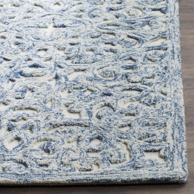 Blue and Ivory Hand-Tufted Wool 4' x 6' Area Rug