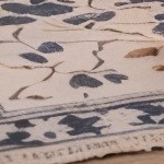 blue cushion/brown wicker